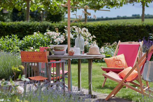 Transform Your Outdoor Living Space with Patterned Textiles This Summer